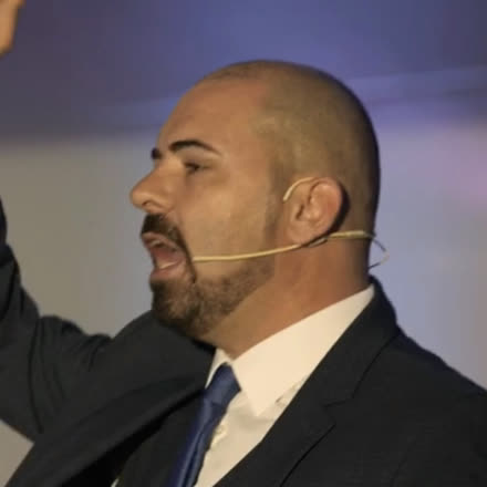 Kevin Mullin speaking at a corporate event